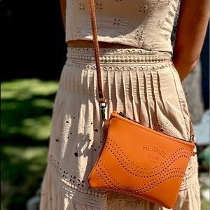 Authentic Hermes wave Neobain wristlet & cross-body